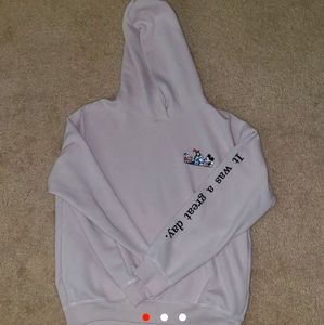 Uniqlo Light Pink Hoodie with Graphic Design